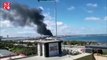 Trablus Limanı'nda saldırıda hedef aldığı belirtilen gemiden dumanlar yükseldi