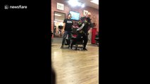 Painful moment man getting NOSE hair waxed walks out of Washington barbershop