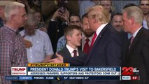 President Donald Trump addresses farmers, while supporters and protestors share their views