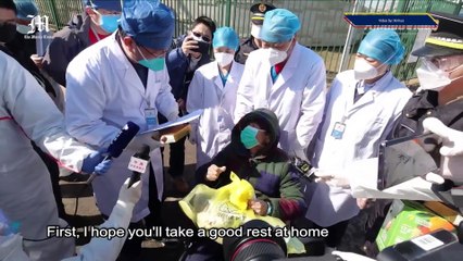 Covid-19 survivor leaves hospital in Wuhan