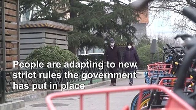 Beijingers adjust to coronavirus restrictions