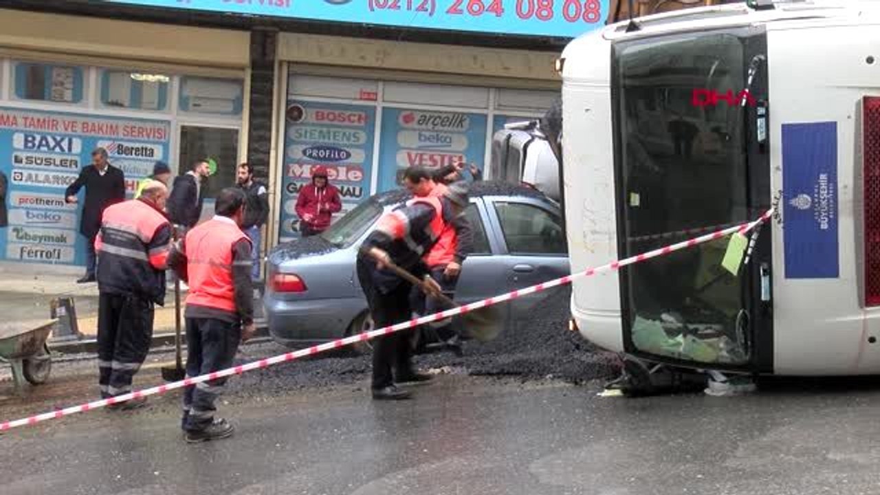 Gaziosmanpaşa'da asfalt yüklü kamyon otomobilin üzerine devrildi