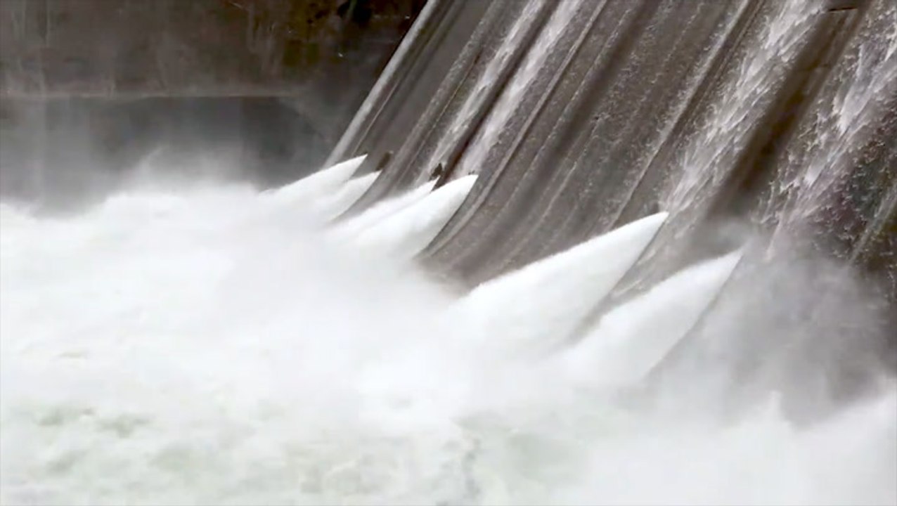 Water roars as it escapes dam