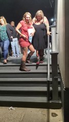 Lady Slips Holding Her Bucket of Beer