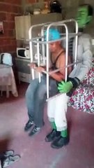 Frankenstein's Monster Carries a Man in a Cage