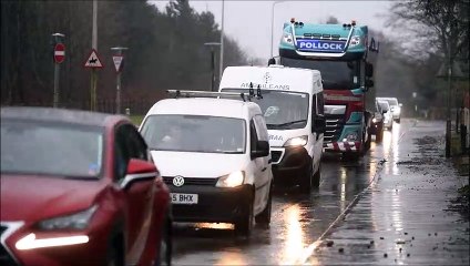 Heavy rain in the Larbert area affecting road and rail. M876 closed northbound at junction two and trains running at reduced speed due to flooding