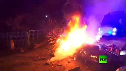 الأوكرانيون يهاجمون حافلات تقل مواطنين عائدين من ووهان