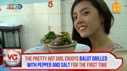 The pretty hot girl enjoys balut grilled with pepper and salt for the first time