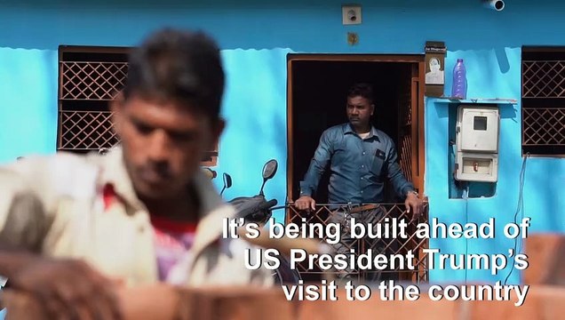 Indian city builds wall to hide slum for Trump visit
