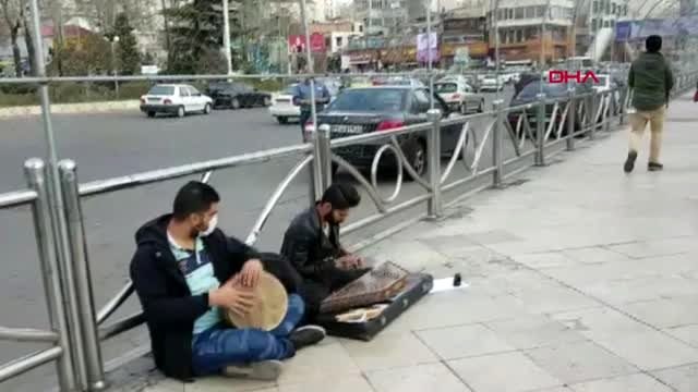 İran'da koronavirüs paniği maskeyle geziyorlar-3