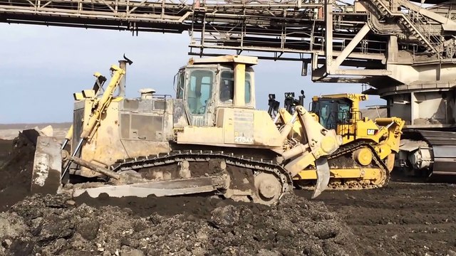 Caterpillar D9T Dozer Working With Komatsu D275AX And Cat D7R