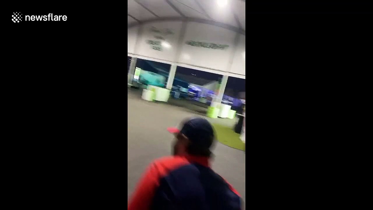 Arizona golf fans excitedly run towards tournament entrance