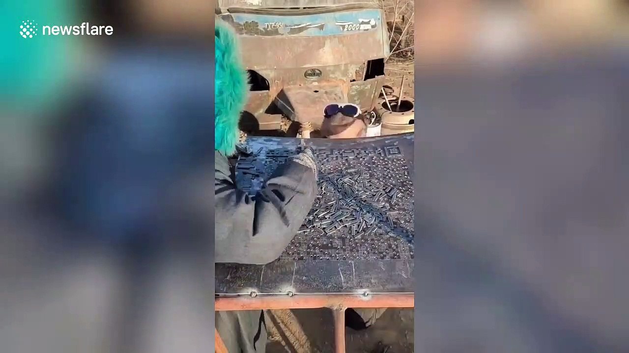 Chinese welder creates QR linking to his social media on metal plate