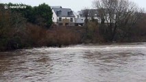 UK's winter of floods continues as River Lune in Lancashire bursts its banks