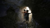 Syrians fleeing attacks in Idlib find shelter in caves