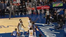 Embiid dunks over hapless Hawks duo