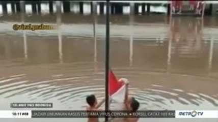 Pengibaran Bendera di Tengah Banjir Jadi Bentuk Kekecewaan Tiga Siswa Ini