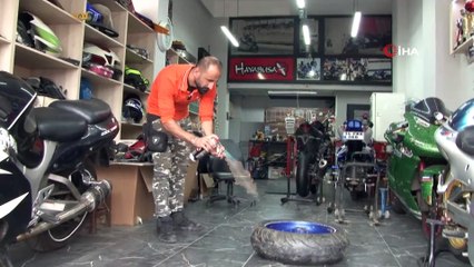 Oto tamircide nitrojen dolu lastik patladı...O anlar kamerada