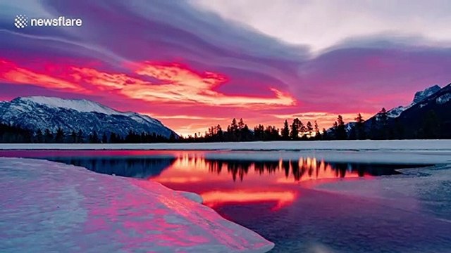 Lenticular clouds look like fire in the sky during Canadian sunrise