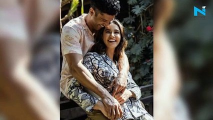 Watch, Farhan Akhtar turns cameraman for Shibani as she takes dip in the pool