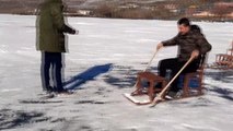 Çıldır Gölü'nde sandalyeli buz kızağı ve kar bisikleti keyfi