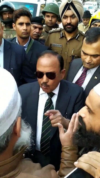 muslim guy showing mirror to the National Security Advisor - Mr. Ajit Doval..