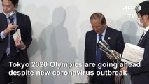 Tokyo Olympics on, organizers say, as virus hits Japan events