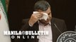 Iranian deputy minister infected with coronavirus wipes sweat off forehead