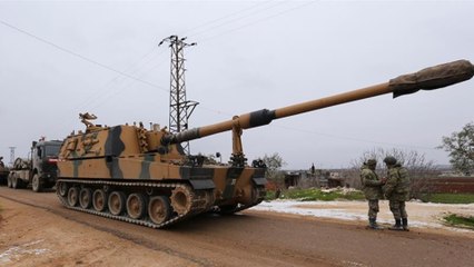 Syrian rebels fight to hold onto key northern town
