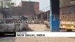 Cars burned as Muslim-Hindu violence leaves 20 dead in New Delhi