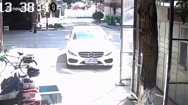 Chinese mother knocks her daughter over after accidentally pressing car accelerator