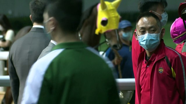 Virus-hit Hong Kong racing gallops on behind closed doors