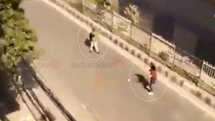 Mystery over whereabouts of Delhi shooter who pointed gun at cop