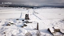 Stunning drone footage shows Peak District lead mine covered in snow in the UK