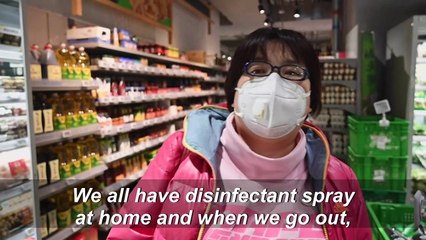Beijing limits crowds after surge of people in supermarkets