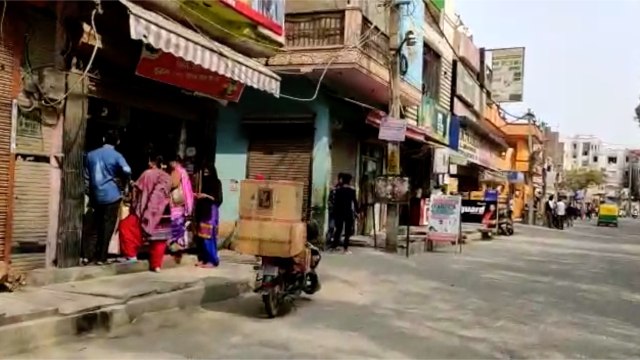 Brij Puri residents seen opening their shops and business establishments post violence