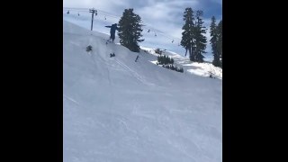 Skier Goes Off A Hill And His Skis Fall Off