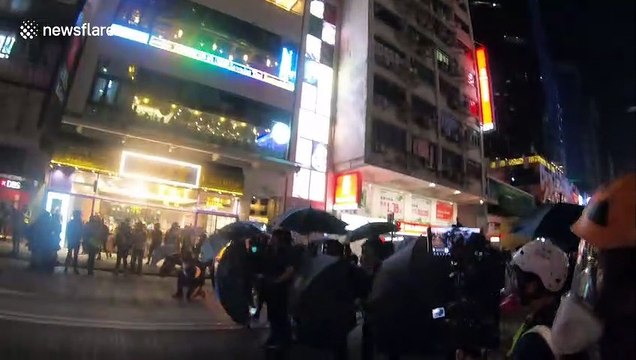 Hong Kong protesters throw molotovs and funeral money in Mongkok