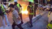 Protesters set fire to a barricade on Nathan road