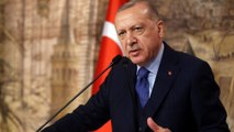Erdogan vows to keep doors open for refugees heading to Europe
