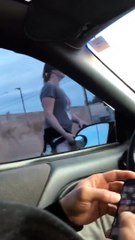 Vehicle Surrounded by Aggressive Mob