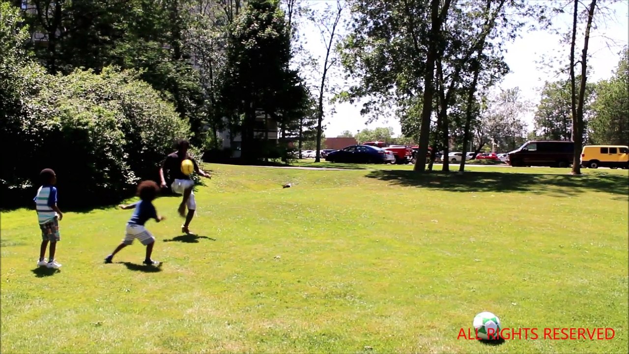 Rasmeshach and the boys playing soccer