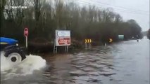 Tractors and jet skis share flooded roads in Ireland after Storm Jorge's rainfall