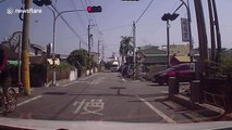 Lorry driver forgets to close container hatch then smashes into electricity post in Taiwan