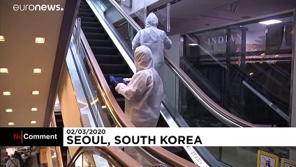 Workers disinfect South Korea department store as COVID-19 spreads