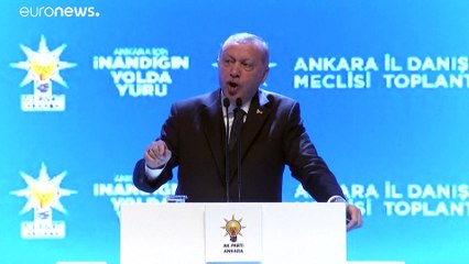 إردوغان يطالب ميركل بـ"تقاسم الأعباء" بعد يوم حافل بالتصريحات
