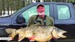 Man Catches Record 37-Pound Lake Trout While Ice Fishing
