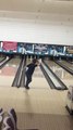 Little Boy Plays Bowling and Strikes Three Separate Pins in One Shot