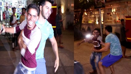 Varun Dhawan ने सेल्फी ले रहे फैन को यूं उठा लिया गोद में,देखें वीडियो | FilmiBeat