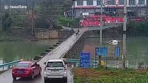 Chinese motorist distracted by phone drives car into river when crossing over bridge